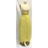 DIANA DORS OWNED YELLOW AND WHITE EVENING GOWN the hand made dress with bead detail to bust section.
