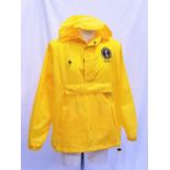 BILL CLINTON - YELLOW RUNNING JACKET embroidered with his name and the Presidential Seal.