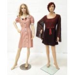 TWO VINTAGE DRESSES comprising a 1960s mini dress, the bust area with copper coloured satin and