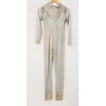 SEXY SPACE SUIT - UNKNOWN PRODUCTION in silver stretch material, accompanied by a Museum of Mom &