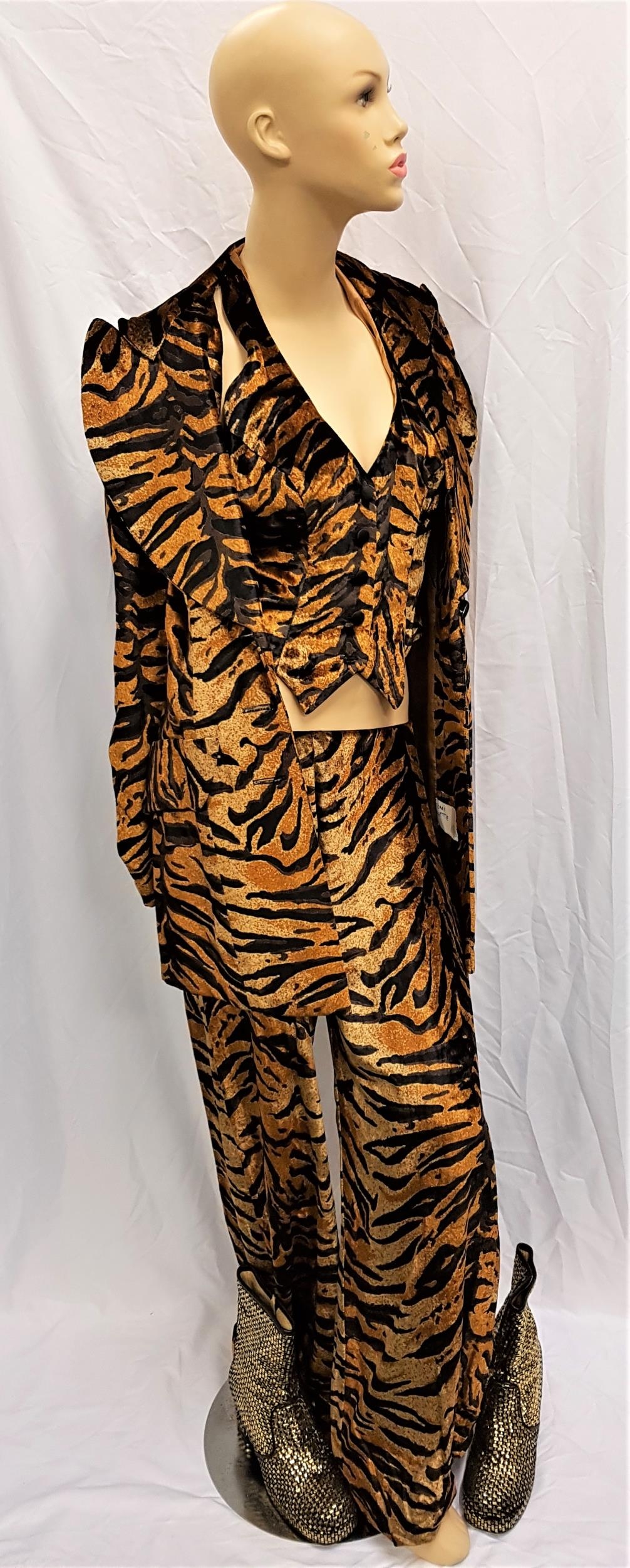 VELVET GOLDMINE (1998) - MANDY SLADE'S TIGER PRINT SUIT AND GOLD SEQUINNED BOOTS - PLAYED BY TONI