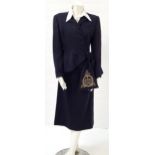 EVITA (1996) - EVA PERON'S NAVY THREE PIECE SUIT - PLAYED BY MADONNA Made by 20th Century props,