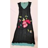 FLORAL, BLACK AND BLUE COAST DRESS- UNKNOWN PRODUCTION Black Coast floral and blue dress with