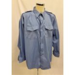 BLUE SHIRT - UNKNOWN PRODUCTION 65% polyester 35% cotton light blue shirt, fits X-Large