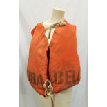 TWO ORIGINAL MOVIE PROP LIFE JACKETS both accompanied by a Paul's Hollywood Cafe & Collectables