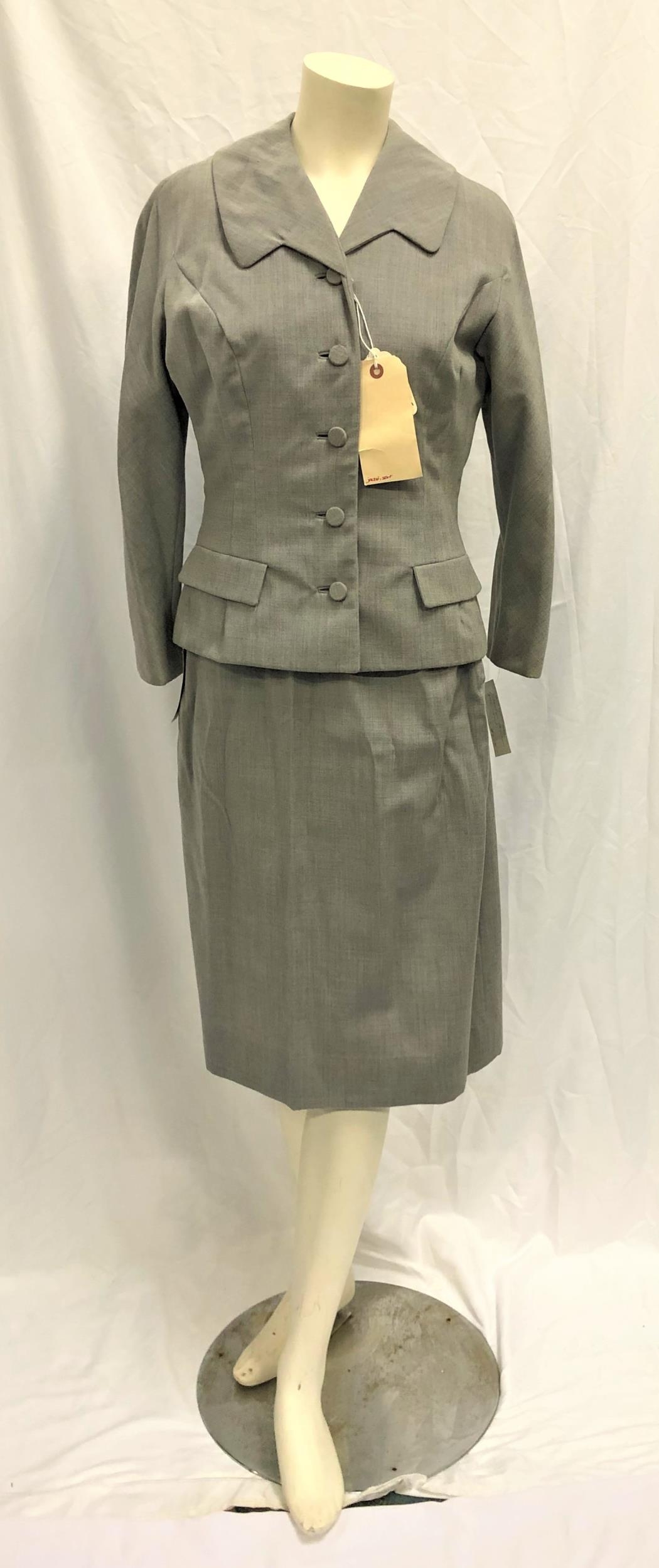 MARILYN MONROE OWNED SILK TWO PIECE GREY SUIT comprising handmade fitted skirt and jacket.