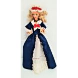 MATEL COLONIAL BARBIE DOLL wearing a navy blue colonial gown with white trim and red bows, with a