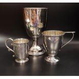 VICTORIAN SILVER CHRISTENING CUP with a scroll handle, Birmingham 1860, a George V silver cup by