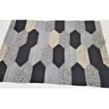 TEXTURED GREY COLOURED RUG with geometric panels in varying shades of grey, 238cm x 173cm
