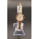 NINE CARAT GOLD CASED LADIES OMER WRISTWATCH the dial with subsidiary seconds dial, Arabic