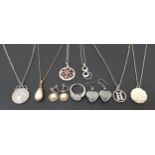 SELECTION OF SILVER AND SILVER MOUNTED JEWELLERY including various silver pendants on chains; a CZ