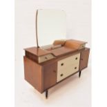 VINTAGE TEAK TWO TONE DRESSING CHEST with a shaped mirror back above a pair of shaped jewellery