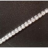 DIAMOND SET EIGHTEEN CARAT WHITE GOLD LINE BRACELET the diamonds totaling approximately 1.5cts and