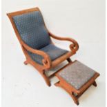 MID 20th CENTURY TEAK ARMCHAIR with a padded back and seat and elaborate scroll arms, standing on