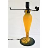 FRENCH ART GLASS TABLE LAMP raised on a circular dark green and yellow foot, with a tapering and