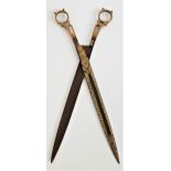 PAIR OF PERSIAN ISLAMIC CALLIGRAPHY SCISSORS damascened with dense scrolling foliage, 25.5cm long