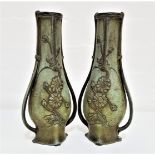 PAIR OF EARLY 20TH CENTURY FRENCH SPELTER VASES in the Art Nouveau style, cast and decorated with
