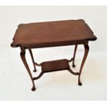 MAHOGANY WINDOW TABLE with a shaped rectangular top standing on cabriole supports united by an