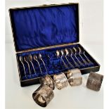 MIXED LOT OF SILVER including a cased set of eleven Edward VII tea spoons and a pair of sugar