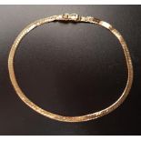 FOURTEEN CARAT GOLD FLAT SNAKE CHAIN BRACELET with safety clasp, approximately 2.8 grams