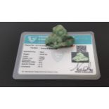 CERTIFIED LOOSE NATURAL EMERALD the rough cut emerald weighing 84.86cts, with ITLGR Gemmological