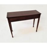 MAHOGANY AND CROSSBANDED SIDE TABLE with a rectangular moulded top above two panelled frieze