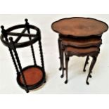 NEST OF MAHOGANY TABLES with shaped tops, standing on slender cabriole supports, 58.5cm high,