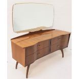 RETRO WALNUT DRESSING CHEST with a shaped mirror back above an inverted breakfront with four