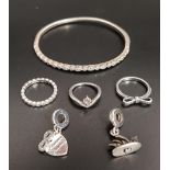 SELECTION OF PANDORA SILVER JEWELLERY comprising a Timeless Elegance Bangle, three rings -