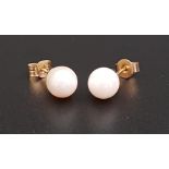 PAIR OF PEARL STUD EARRINGS the pearls approximately 6.5mm diameter, in nine carat gold