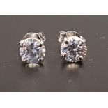 PAIR OF CZ STUD EARRINGS each CZ approximately 0.85cts, in unmarked gold, the butterflies marked '