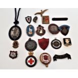 INTERESTING SELECTION OF VINTAGE BADGES AND MEDALS some with enamel detail, including a Certified