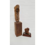 THE GHOSTLY WOMAN driftwood sculpture with a circular brass inset disc, mounted on an oblong teak