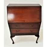 MAHOGANY BUREAU the fall flap with an inset leather and fitted interior above two long drawers,