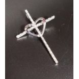 DIAMOND SET CROSS PENDANT with central heart detail, in unmarked white gold, 3.2cm high