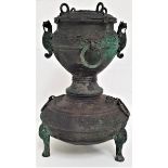 CHINESE LARGE ARCHAIC BRONZE THREE PIECE YAN STEAMER raised on three supports with masks to a