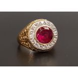 IMPRESSIVE RUBY AND CZ DRESS RING the central bezel set round cut ruby approximately 2.5cts in