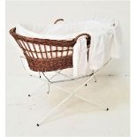 WICKER CHILD'S CRIB of shaped form with side carrying handles, foam mattress, liner and folding