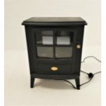 DIMPLEX ELECTRIC HEATER styled as a log burning stove, 55cm high