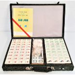 MAH JONG SET in a fitted case with rule book, new and unused