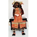 JAPANESE MINIATURE SET OF SAMURAI ARMOUR with all pieces, on a stand and contained in a lacquer box,