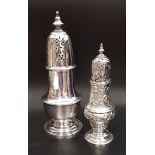 VICTORIAN SILVER SUGAR SIFTER of baluster form with embossed decoration, raised on a circular