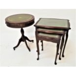 MAHOGANY DRUM TOP OCCASIONAL TABLE with an inset green leather top above three frieze drawers, on