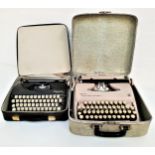OLYMPIA SPLENDID 66 TYPEWRITER with a black metal body and cream keys, in a zipped travel case,
