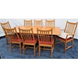 ERCOL LIGHT OAK EXTENDING DINING TABLE WITH EIGHT CHAIRS the table with a rectangular pull apart top