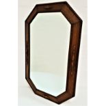 OAK OCTAGONAL WALL MIRROR with a bevelled plate, 78.5cm high