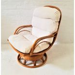 BAMBOO ARMCHAIR with a loose back and seat cushion, on a circular revolving base