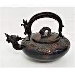 CHINESE BRONZE KETTLE of squat circular form, with a swing dragon handle, the body with a dragon