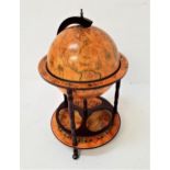 TERRESTRIAL GLOBE DRINKS TROLLEY the lift up lid revealing a fitted interior, with a lower