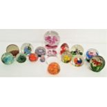 SEVENTEEN GLASS PAPERWEIGHTS of varying sizes with examples including a Caithness Myriad,